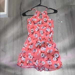 flower romper. no rips, tears, or stains